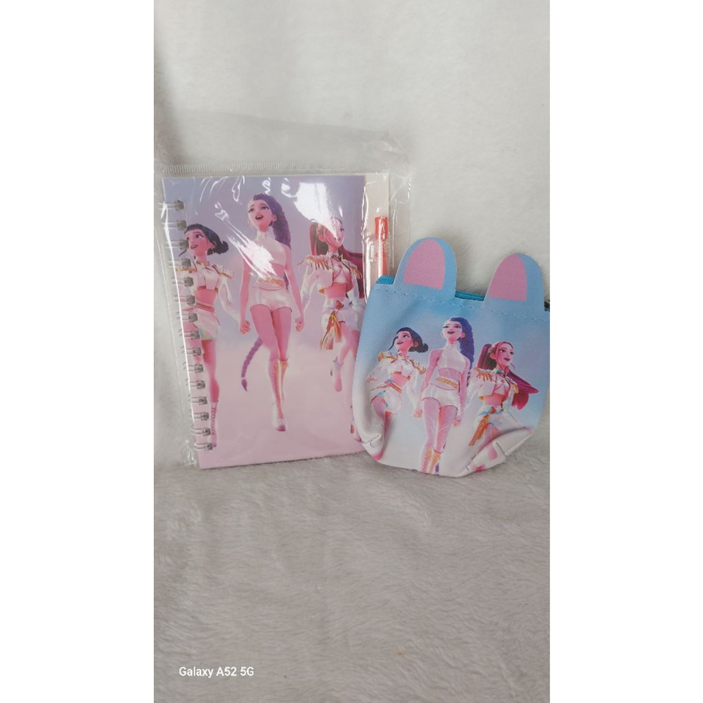 Join Rumi, Mira, and Zoey and hunt with this Notebook & Coin Purse Set. So cute